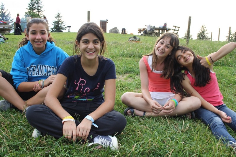 Village Camps International Summer Camp Leysin, Switzerland 2026-08-15 https://www.villagecamps.com/journals_admin/images/691-14-campfire yellows (32).jpg